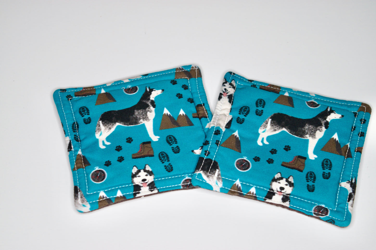 Huskies and Small White Flowers Mini Hot Pads