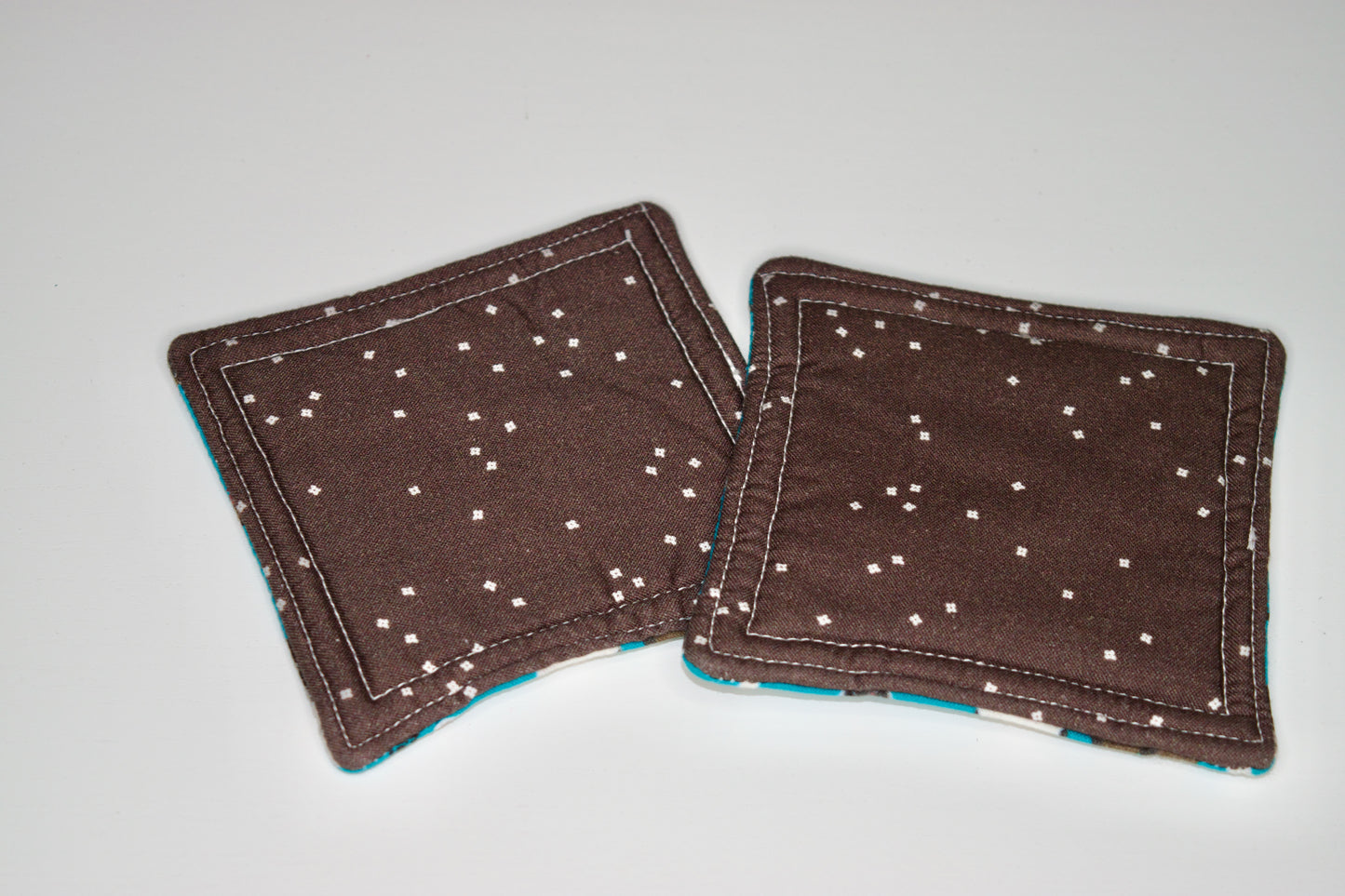 Huskies and Small White Flowers Mini Hot Pads
