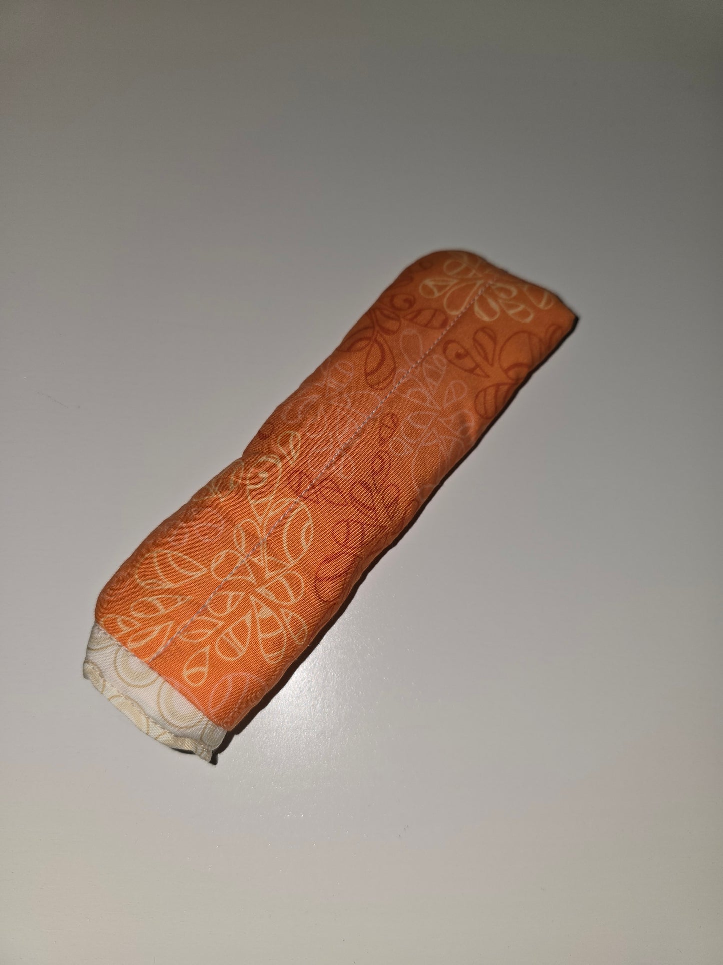 Orange Design / Tan Circle Skillet Handle Holder